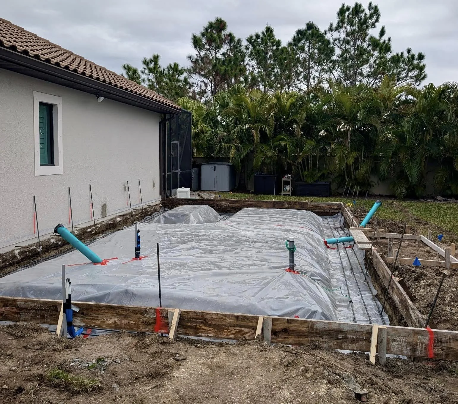 Formed residential foundation area with vapor barrier and reinforcement prepared by JCD Concrete